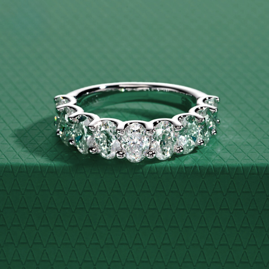 The Ovalina – Oval Cut Half Eternity Moissanite Ring