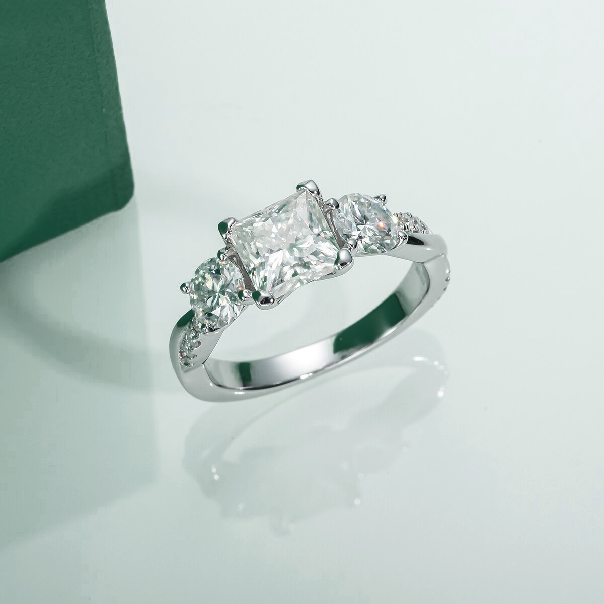 The Elysian – Princess & Round Brilliant Three-Stone Moissanite Ring
