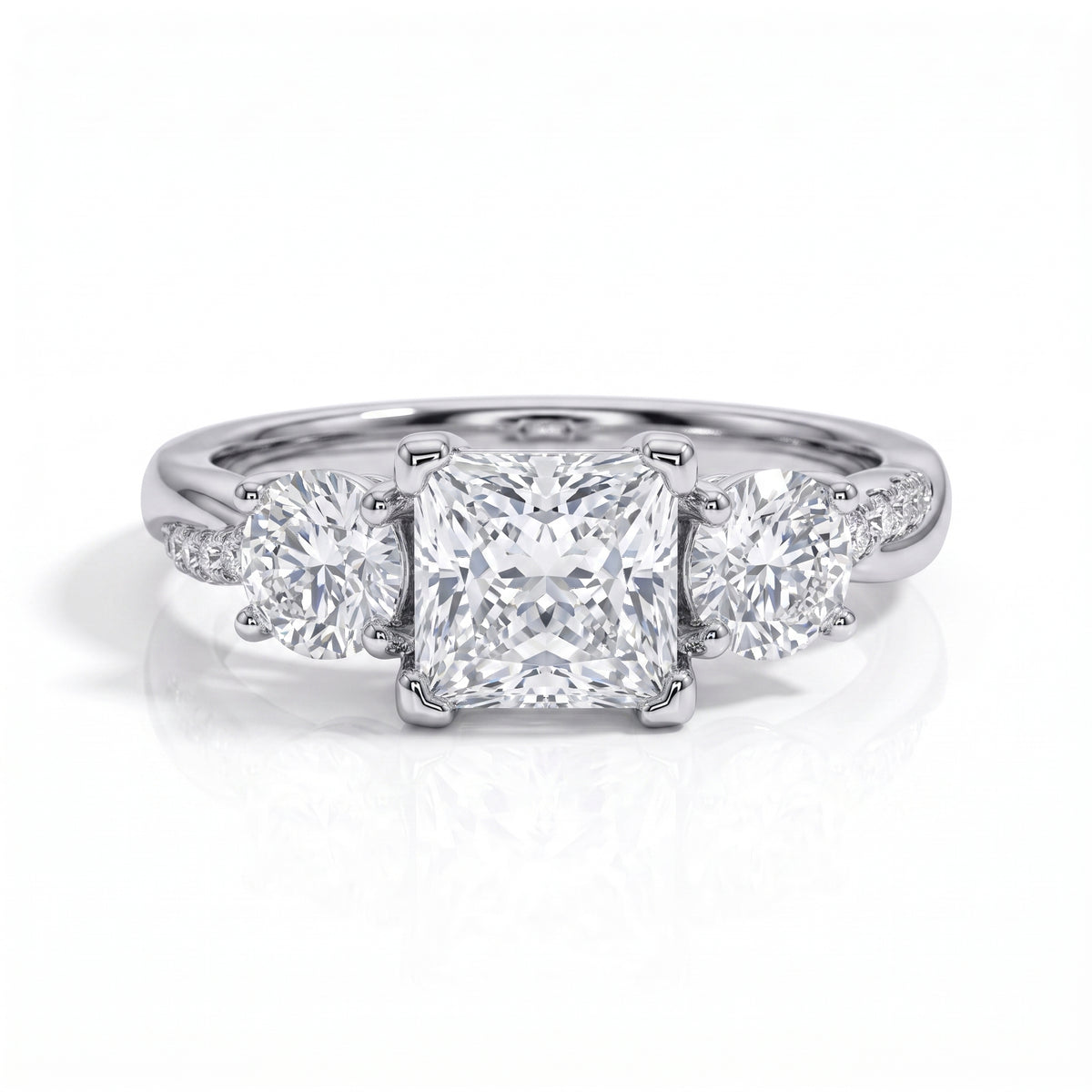The Elysian – Princess & Round Brilliant Three-Stone Moissanite Ring