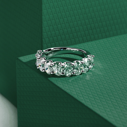 The Ovalina – Oval Cut Half Eternity Moissanite Ring