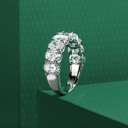 The Ovalina – Oval Cut Half Eternity Moissanite Ring