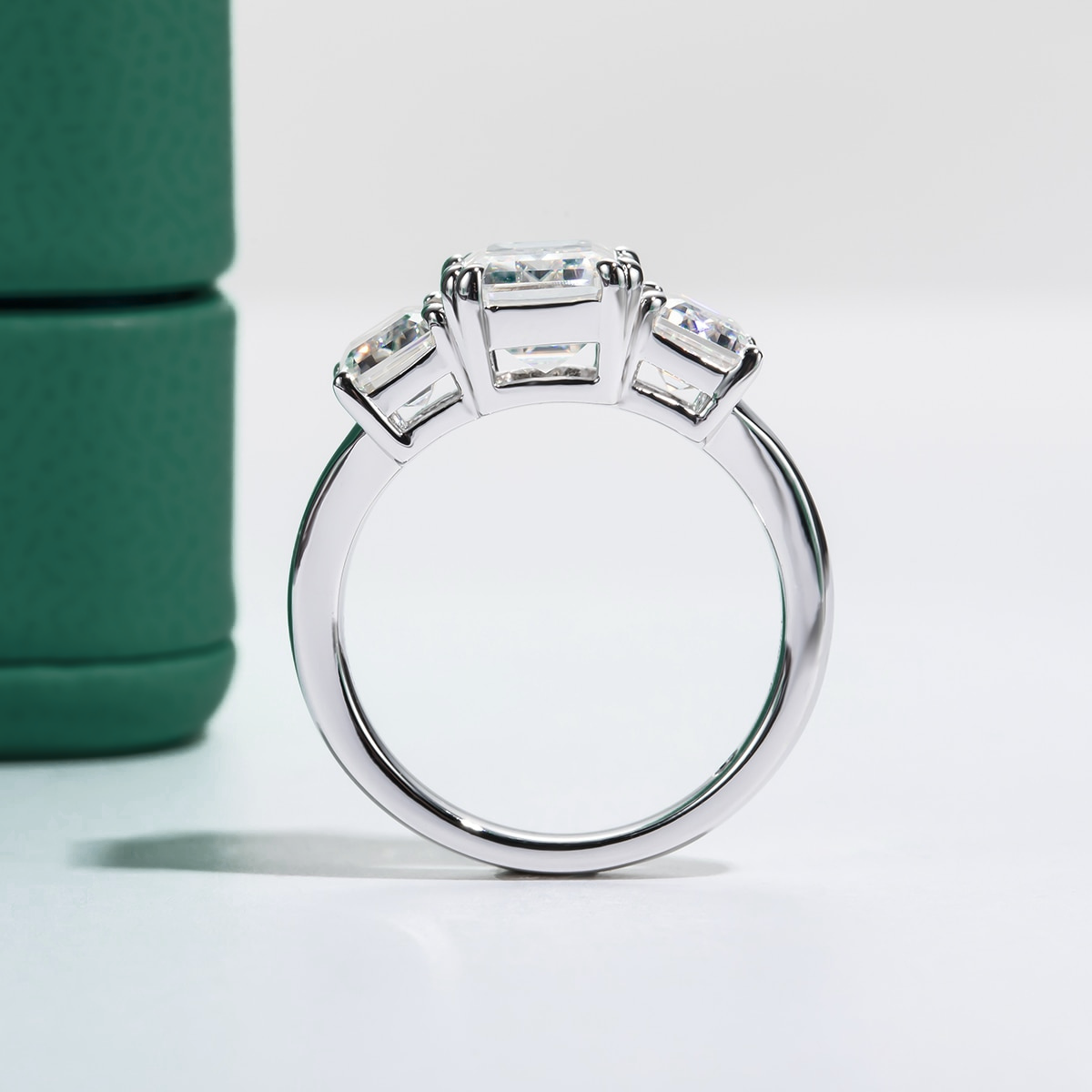 The Ava - Emerald Cut Three-Stone Moissanite Ring