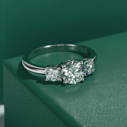 The Mirage - Round Brilliant Three-Stone Moissanite Ring