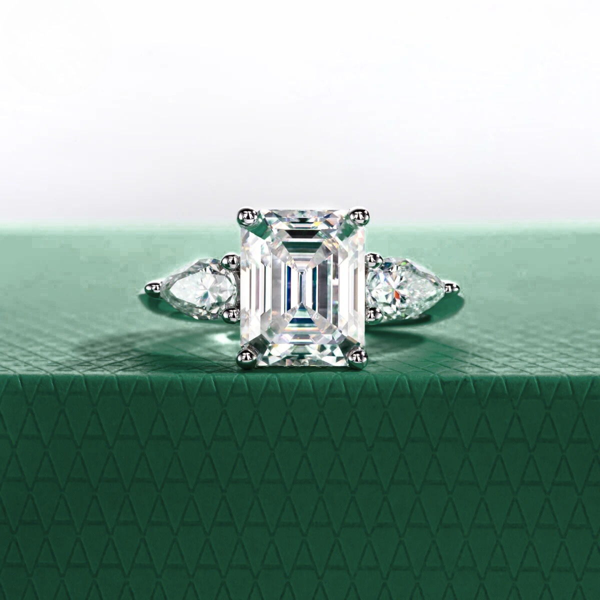 The Clarisse - Emerald & Pear Three-Stone Moissanite Ring