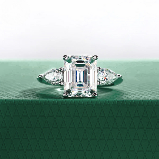 The Clarisse - Emerald & Pear Three-Stone Moissanite Ring