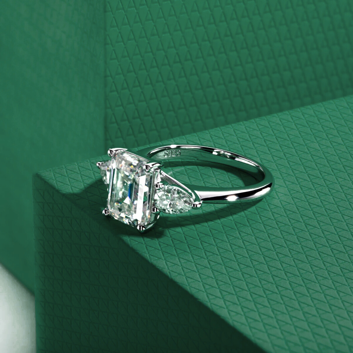 The Clarisse - Emerald & Pear Three-Stone Moissanite Ring