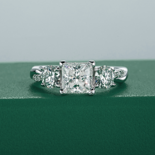 The Elysian – Princess & Round Brilliant Three-Stone Moissanite Ring