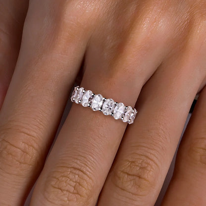 The Ovalina – Oval Cut Half Eternity Moissanite Ring