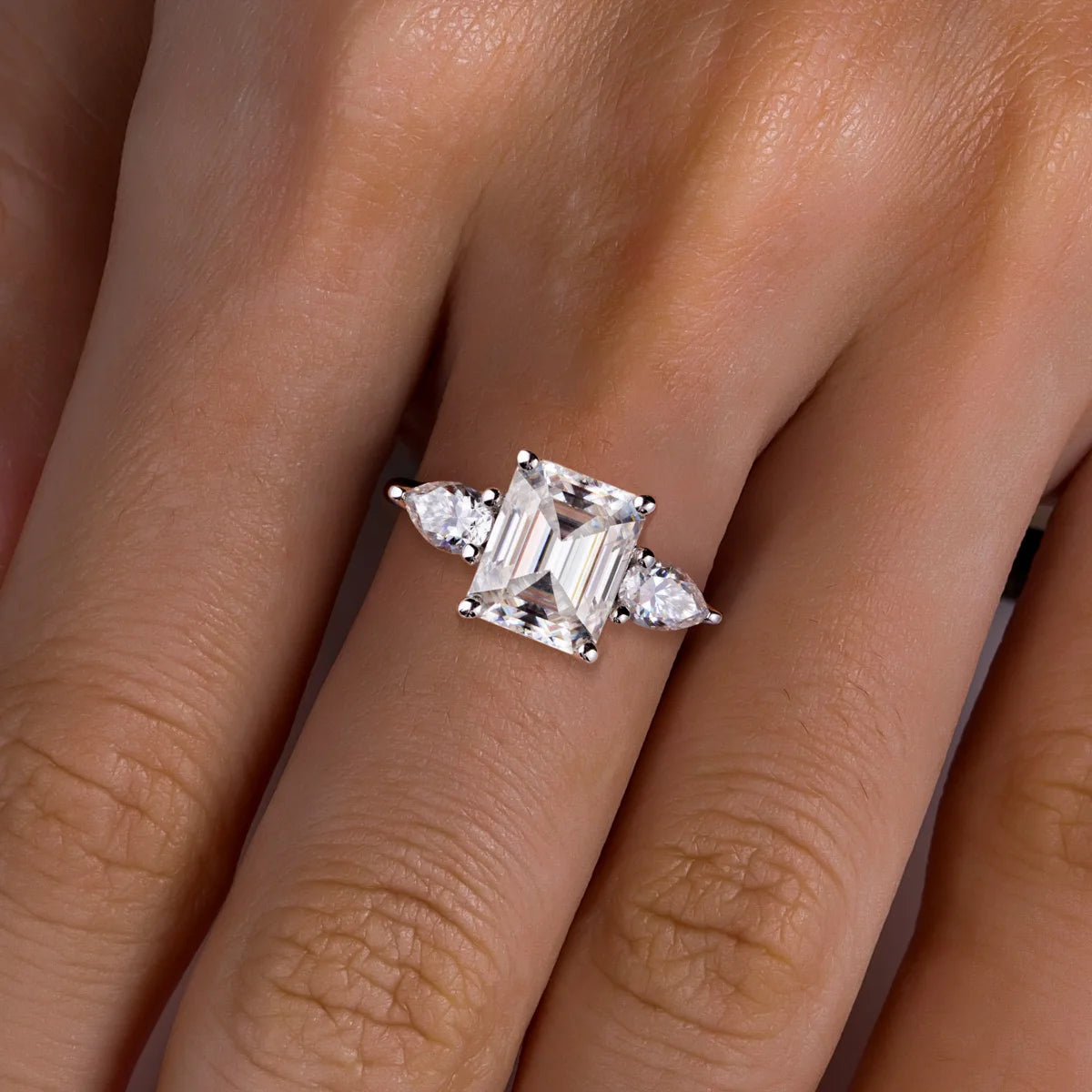 The Clarisse - Emerald & Pear Three-Stone Moissanite Ring